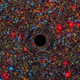 Computer simulation of the newly discovered supermassive black hole / NASA, ESA, and D. Coe, J. Anderson, and R. van der Marel (STScI)